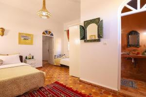 Postel nebo postele na pokoji v ubytování Aura Retreat