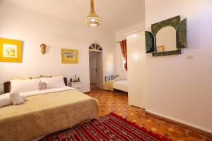 Postel nebo postele na pokoji v ubytování Aura Retreat