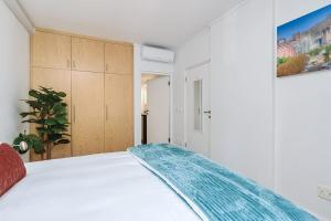 Ένα ή περισσότερα κρεβάτια σε δωμάτιο στο Modern Family Friendly Retreat