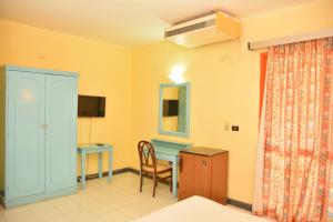 TV/trung tâm giải trí tại Apartment Empire Hotel