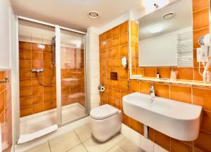 Kúpeľňa v ubytovaní Hotel Słoneczny Młyn