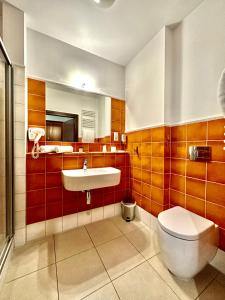 Kúpeľňa v ubytovaní Hotel Słoneczny Młyn