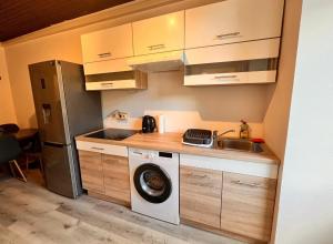 Dapur atau dapur kecil di Apartment Bon Voyage II +5 gambar