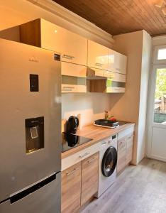 Dapur atau dapur kecil di Apartment Bon Voyage II