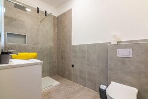 Koupelna v ubytování B&B Room + 7 fotografií