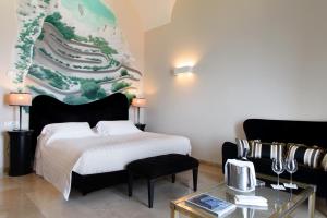 Posteľ alebo postele v izbe v ubytovaní Villa Marina Capri