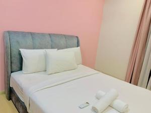 Giường trong phòng chung tại Star KLCC Dynamic Hospitality