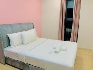 Giường trong phòng chung tại Star KLCC Dynamic Hospitality