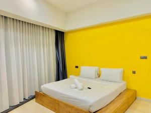 Giường trong phòng chung tại Star KLCC Dynamic Hospitality