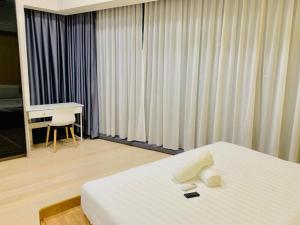 Giường trong phòng chung tại Star KLCC Dynamic Hospitality
