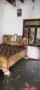 a bedroom with two beds in a room at Dinesh kumar in Jāmb