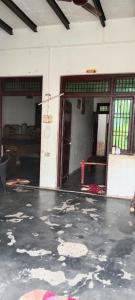 an empty room with an open door and a room with a floor at Dinesh kumar in Jāmb