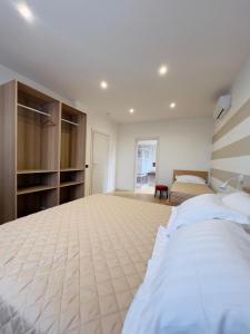 Postel nebo postele na pokoji v ubytování B&B Vigna21 + 3 fotografie