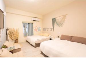 Una cama o camas en una habitación de 有風小院