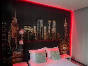 Posteľ alebo postele v izbe v ubytovaní The Garden Apartment