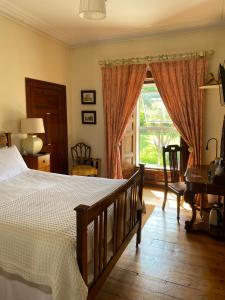 Voodi või voodid majutusasutuse Glendine Country House Wexford toas