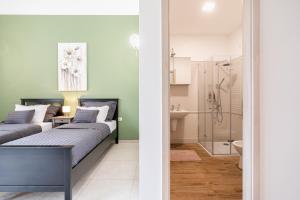 Kúpeľňa v ubytovaní Amora Homes Basilica Monnalisa luxury 3 bedrooms apartment with amazing view NEED RESERVATION X FREE PARKING