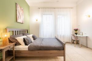 Posteľ alebo postele v izbe v ubytovaní Amora Homes Basilica Monnalisa luxury 3 bedrooms apartment with amazing view NEED RESERVATION X FREE PARKING