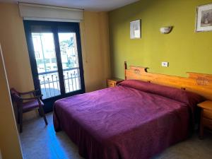 Postel nebo postele na pokoji v ubytování DORMERO Hotel y Albergue Sahagun + 9 fotografií