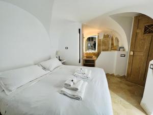 Posteľ alebo postele v izbe v ubytovaní Casa Cavour