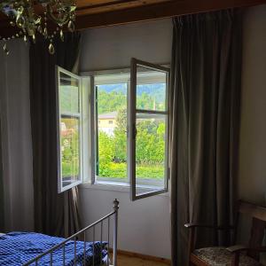 Postel nebo postele na pokoji v ubytování Sachserhof Ferienwohnungen in Sachsenburg + 37 fotografií