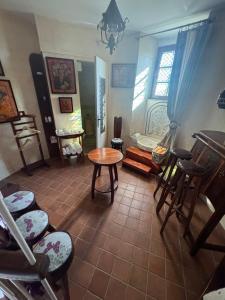 Posezení v ubytování Moulin de la Licorne + 9 fotografií