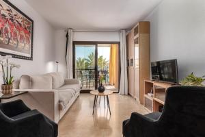 A television and/or entertainment centre at marina real 221