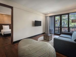 Postel nebo postele na pokoji v ubytování Pullman Bali Legian Beach