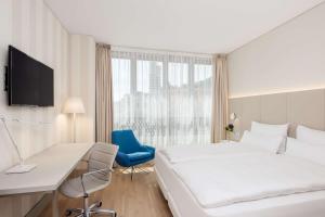 Voodi või voodid majutusasutuse NH Graz City toas