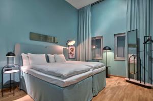 Letto o letti in una camera di Scandic Göteborg Central