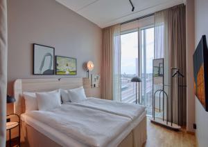 Letto o letti in una camera di Scandic Göteborg Central