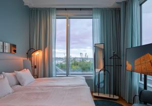 Letto o letti in una camera di Scandic Göteborg Central