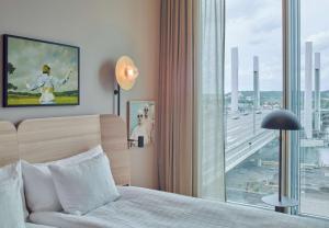 Letto o letti in una camera di Scandic Göteborg Central