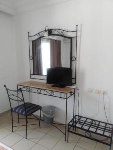 Μια τηλεόραση ή/και κέντρο ψυχαγωγίας στο Hotel Les Citronniers Hammamet +12 φωτογραφίες