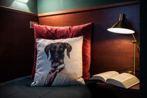 Letto o letti in una camera di Albergo Reale
