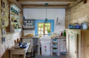 Cuisine ou kitchenette dans l'établissement Chata Nad Wisłokiem