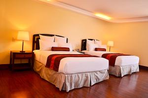 Voodi või voodid majutusasutuse Thunderbird Resorts - Rizal toas