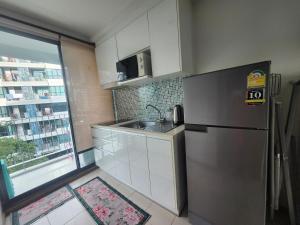 Kuchyň nebo kuchyňský kout v ubytování 中央公寓 1bedroom Centrio 804 Condominium 211