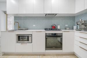 Η κουζίνα ή μικρή κουζίνα στο Gallery on Kent - Prime Location