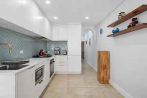 Η κουζίνα ή μικρή κουζίνα στο Gallery on Kent - Prime Location
