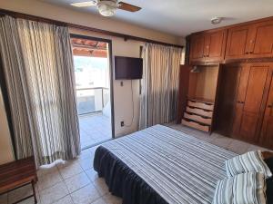 Postel nebo postele na pokoji v ubytování Cobertura linda a 6 min Praia Tenório em Ubatuba