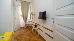 TV a/nebo společenská místnost v ubytování La Posada by Rentbeat