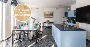 TV a/nebo společenská místnost v ubytování Falkensteiner Family Hotel Diadora