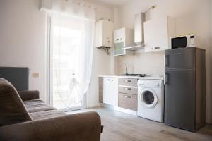 Kuchyňa alebo kuchynka v ubytovaní Residence Rimini Mare