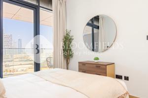 Postel nebo postele na pokoji v ubytování Bloomfields 1Br Supremee Al Maryah Island