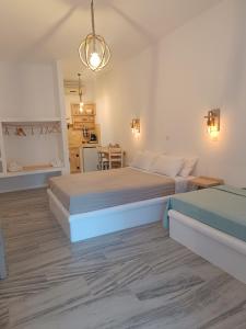 Postel nebo postele na pokoji v ubytování Athina Studio Apartments + 96 fotografií