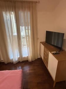 TV a/nebo společenská místnost v ubytování XX Settembre 43 n2