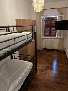 Postel nebo postele na pokoji v ubytování XX Settembre 43 n2