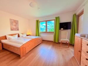 Postel nebo postele na pokoji v ubytování Wiesen Appartment