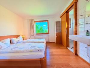 Postel nebo postele na pokoji v ubytování Wiesen Appartment